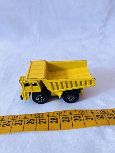 Matchbox dumping truck - dumping,